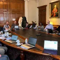 A group round a boardroom table